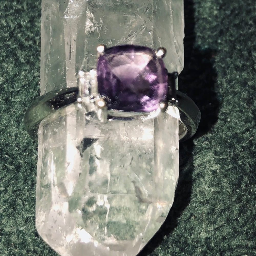 Genuine cushion cut amethyst in 10 k white gold